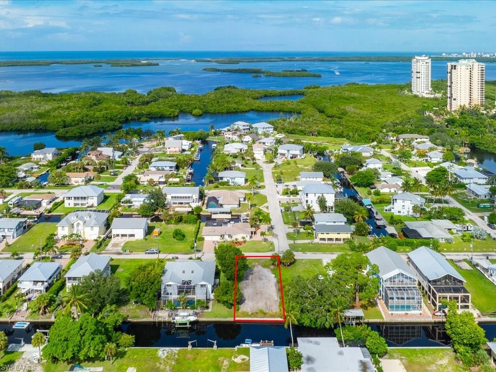 a view of a city with an ocean