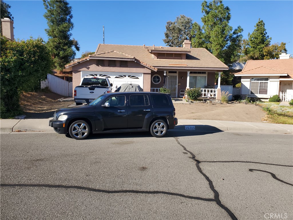 a car parked in front of a house