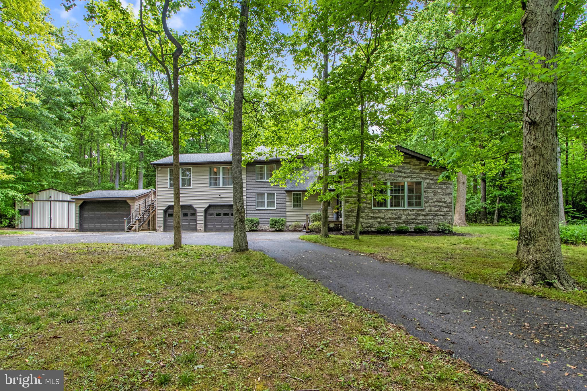 front view of a house with a big yard