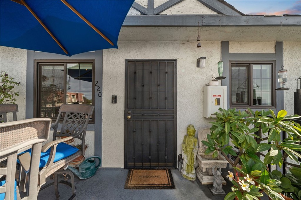 a front view of a house with patio