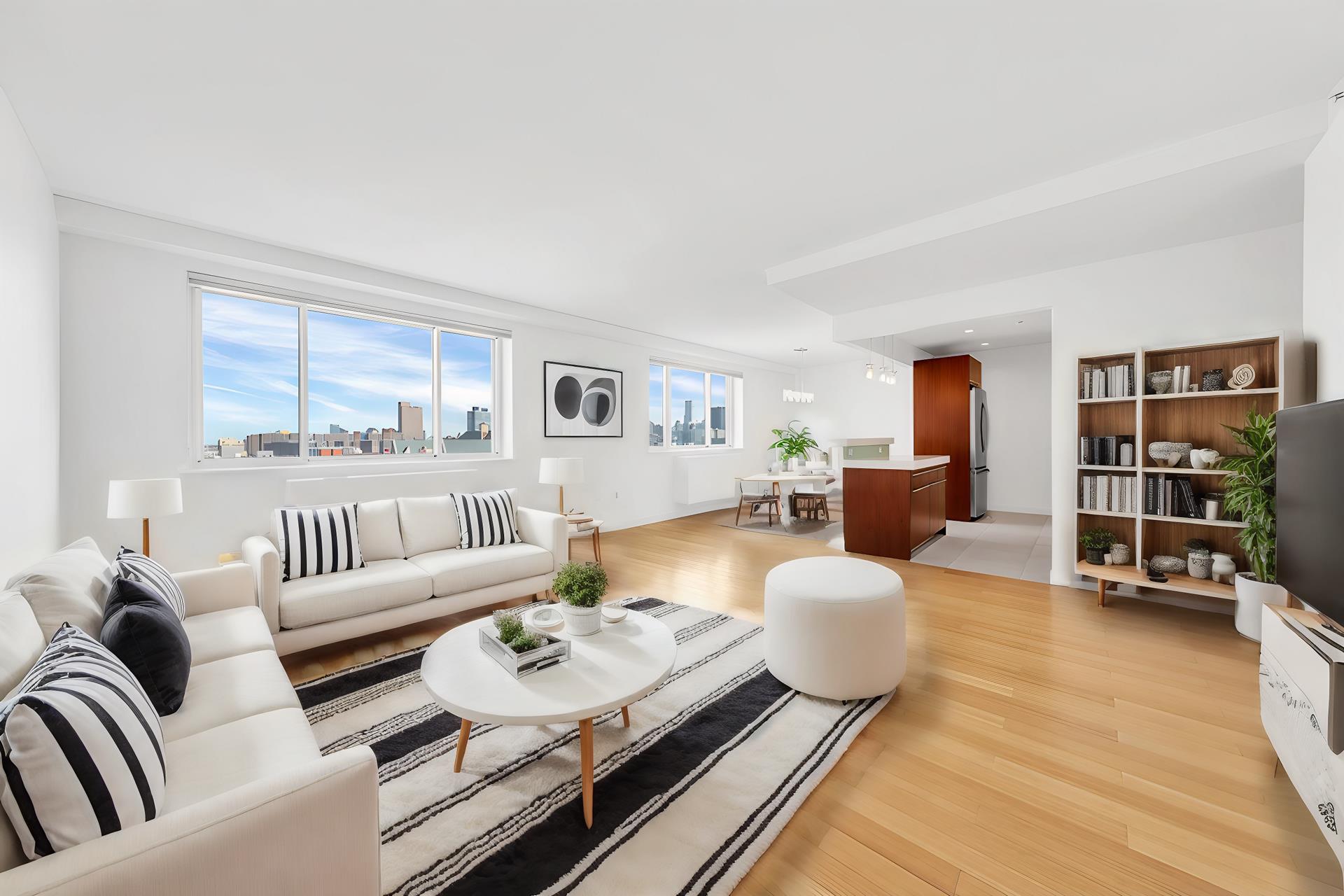 a living room with furniture and a book shelf