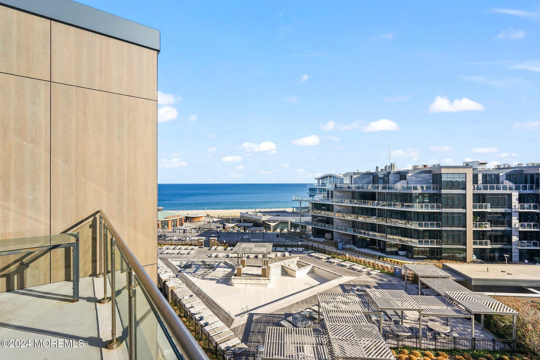 a view of a balcony with city view