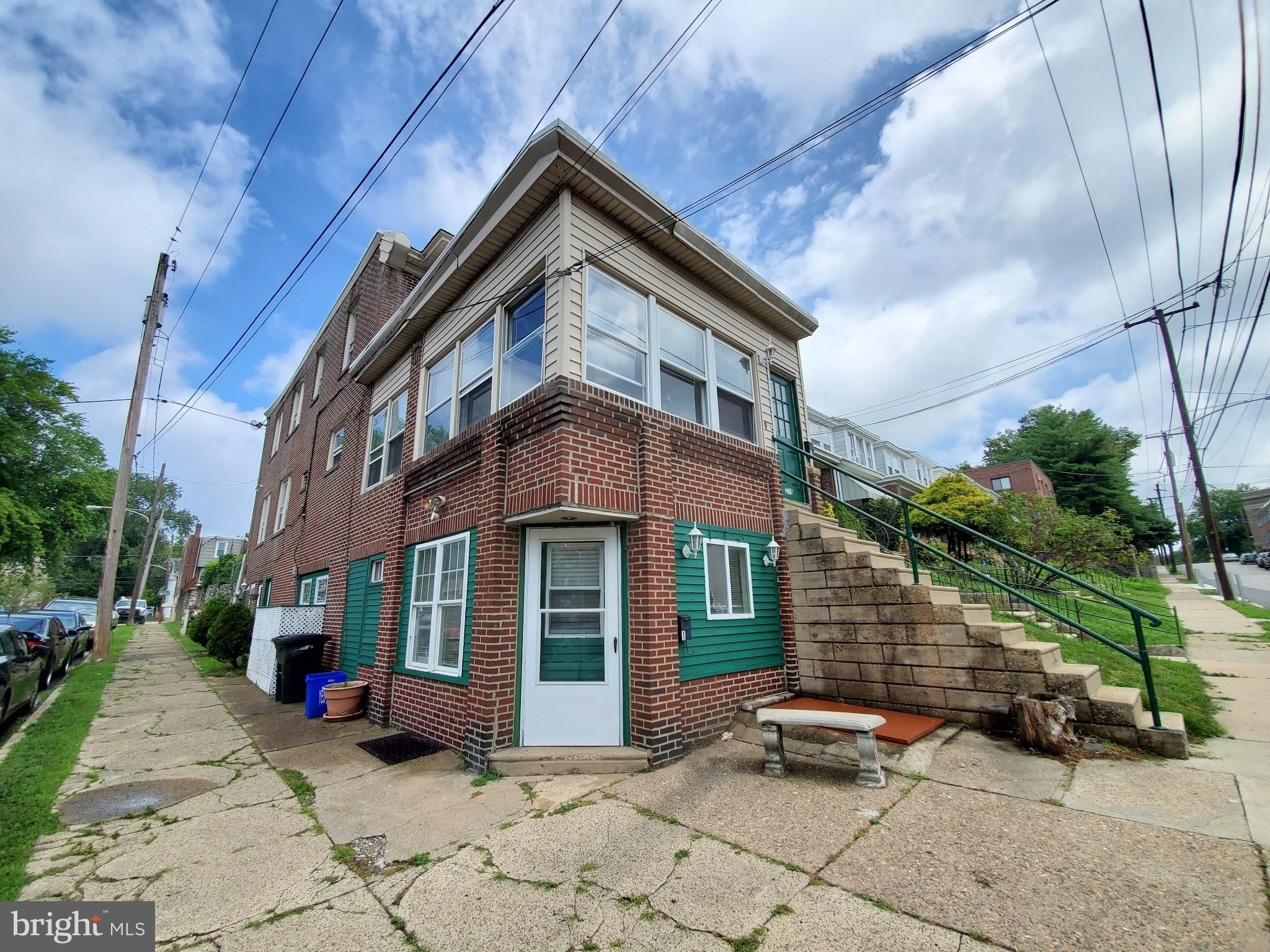 a view of a brick building with many windows