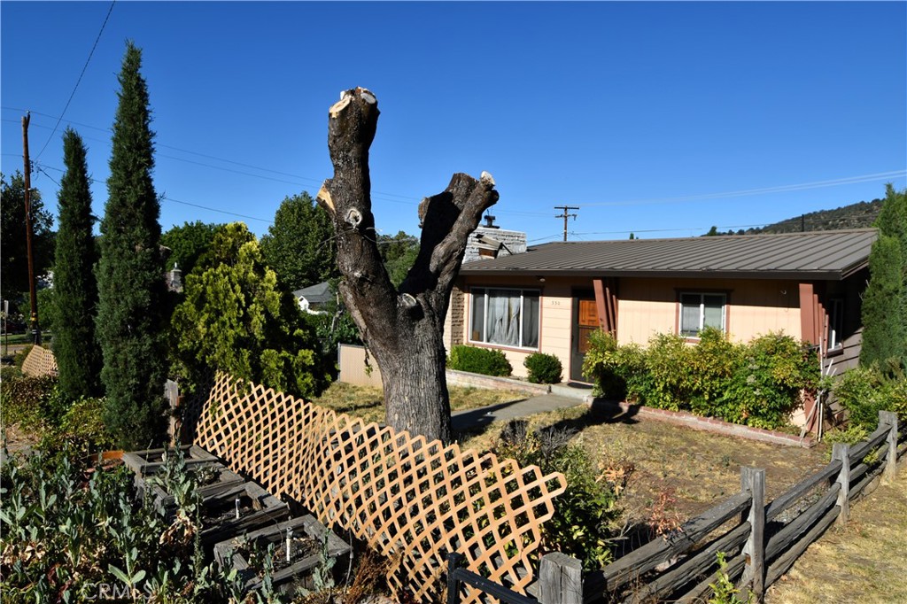 a view of a patio with two chairs