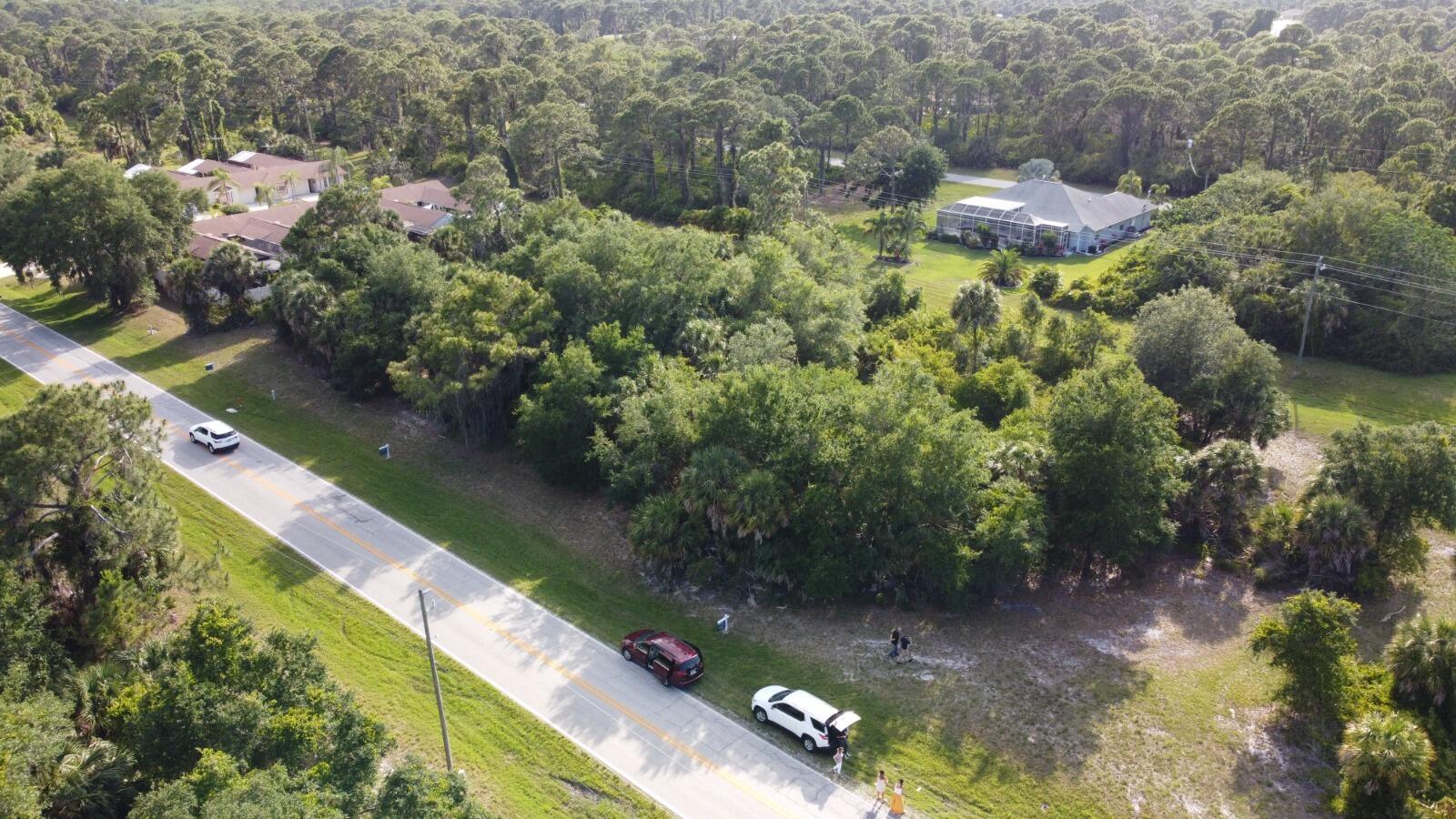 a view of a lake with a yard