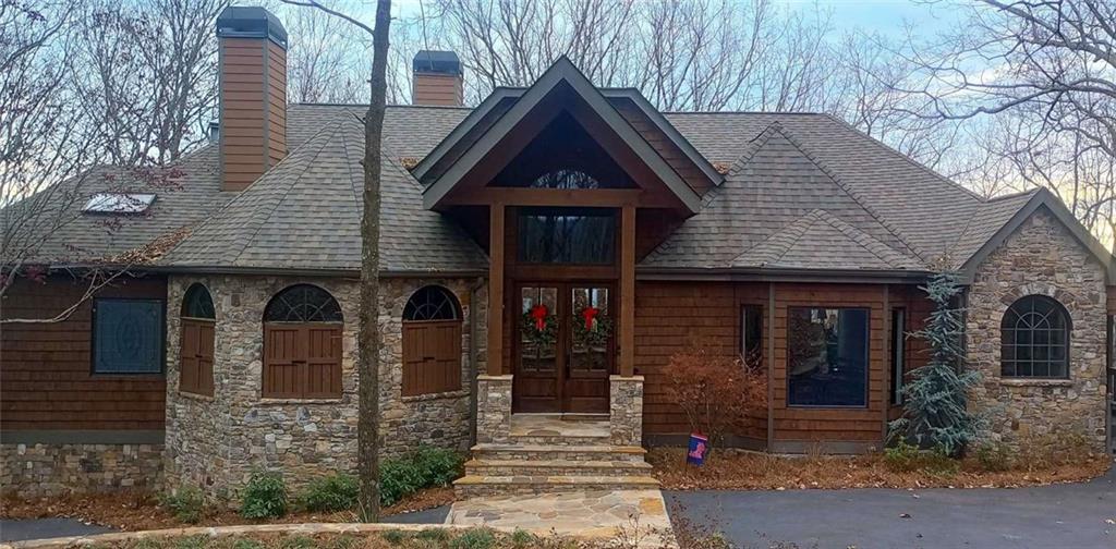 a front view of a house with garage