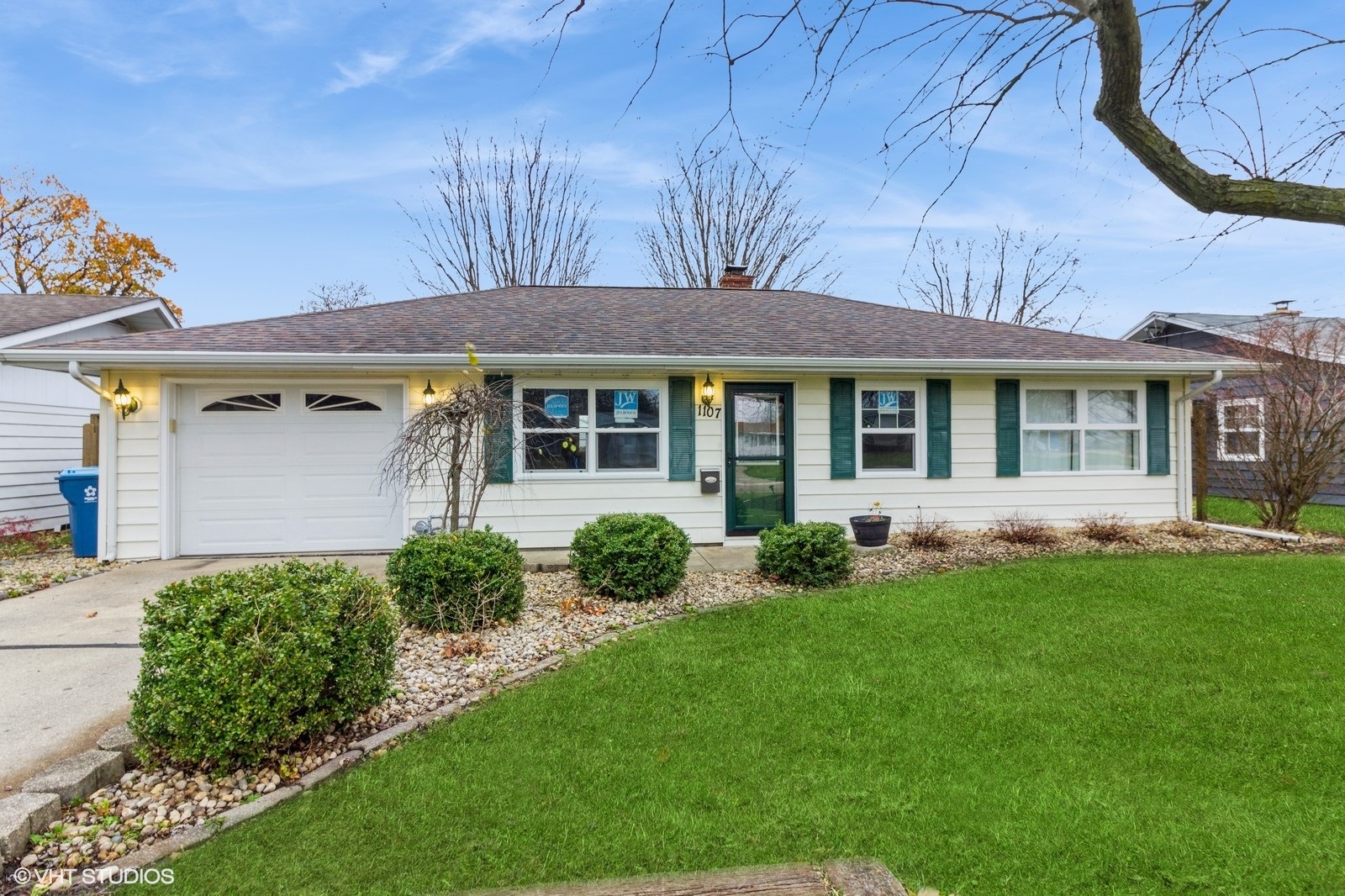 front view of a house with a yard