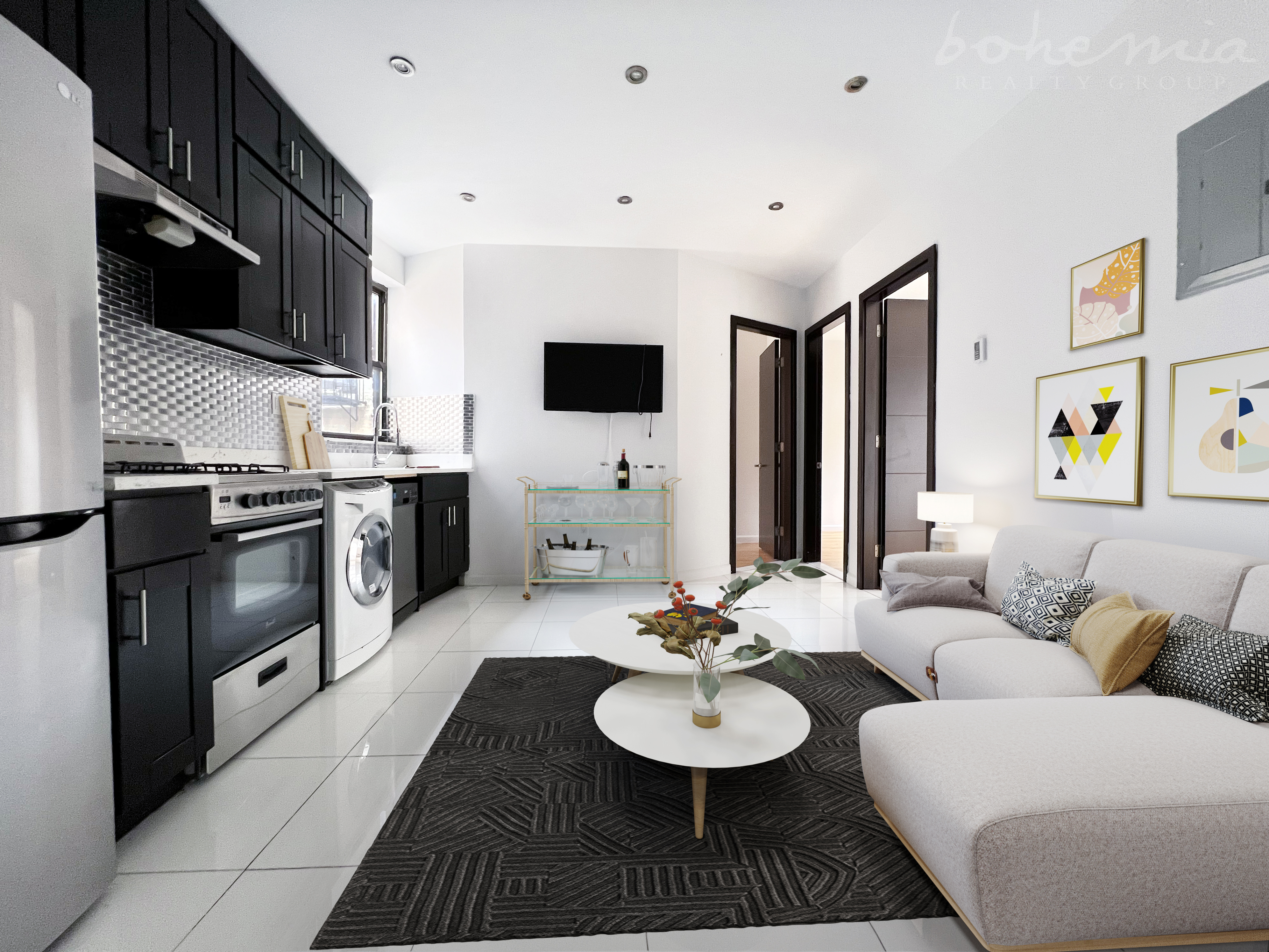 a living room with stainless steel appliances kitchen island granite countertop a sink and a stove top oven with wooden floor