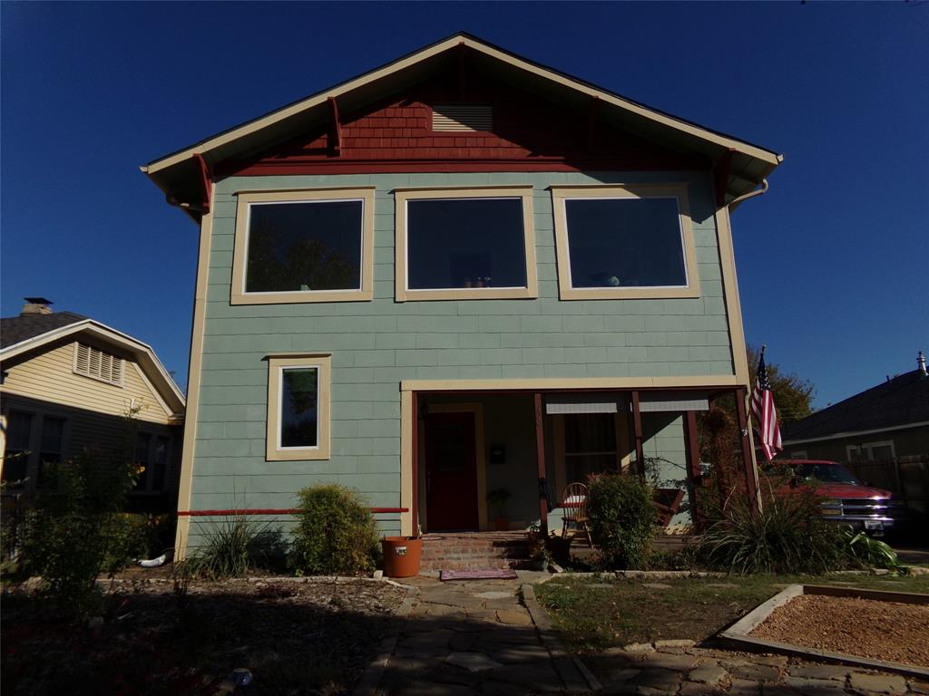 a front view of a house with yard