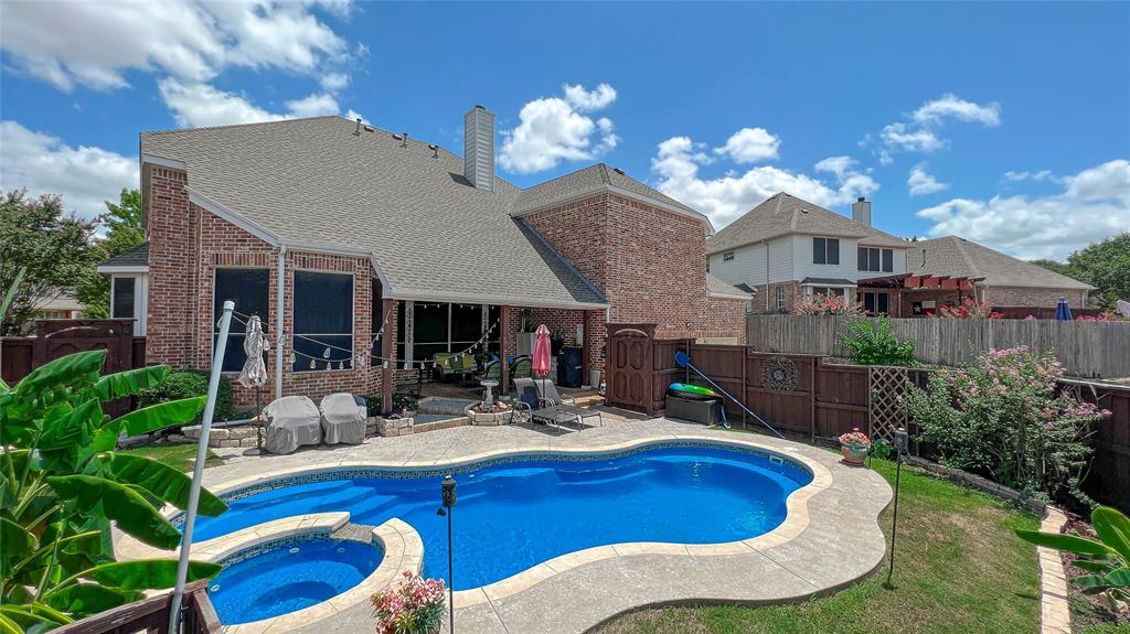 a swimming pool with outdoor seating yard and livingroom