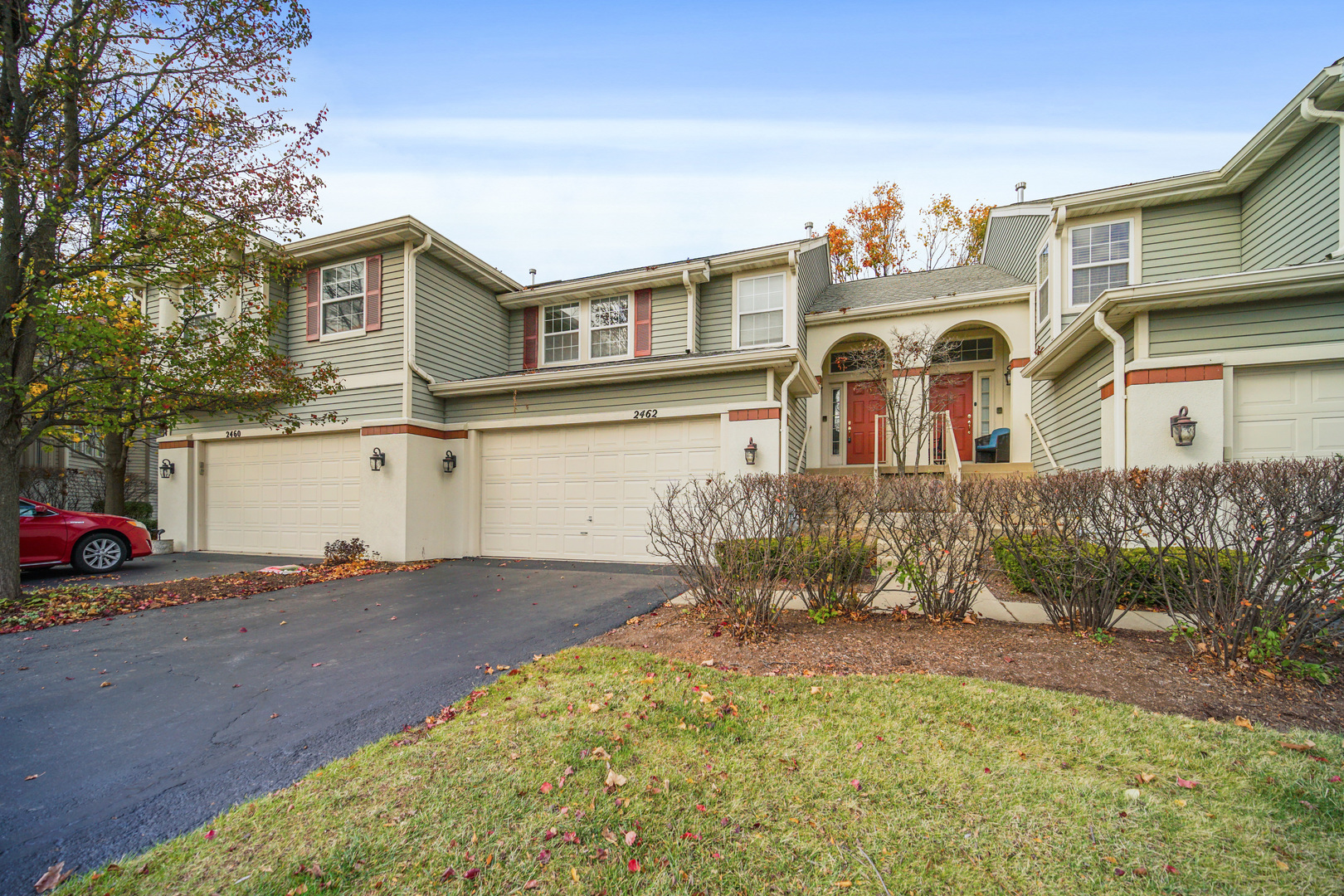 a front view of a house with a yard