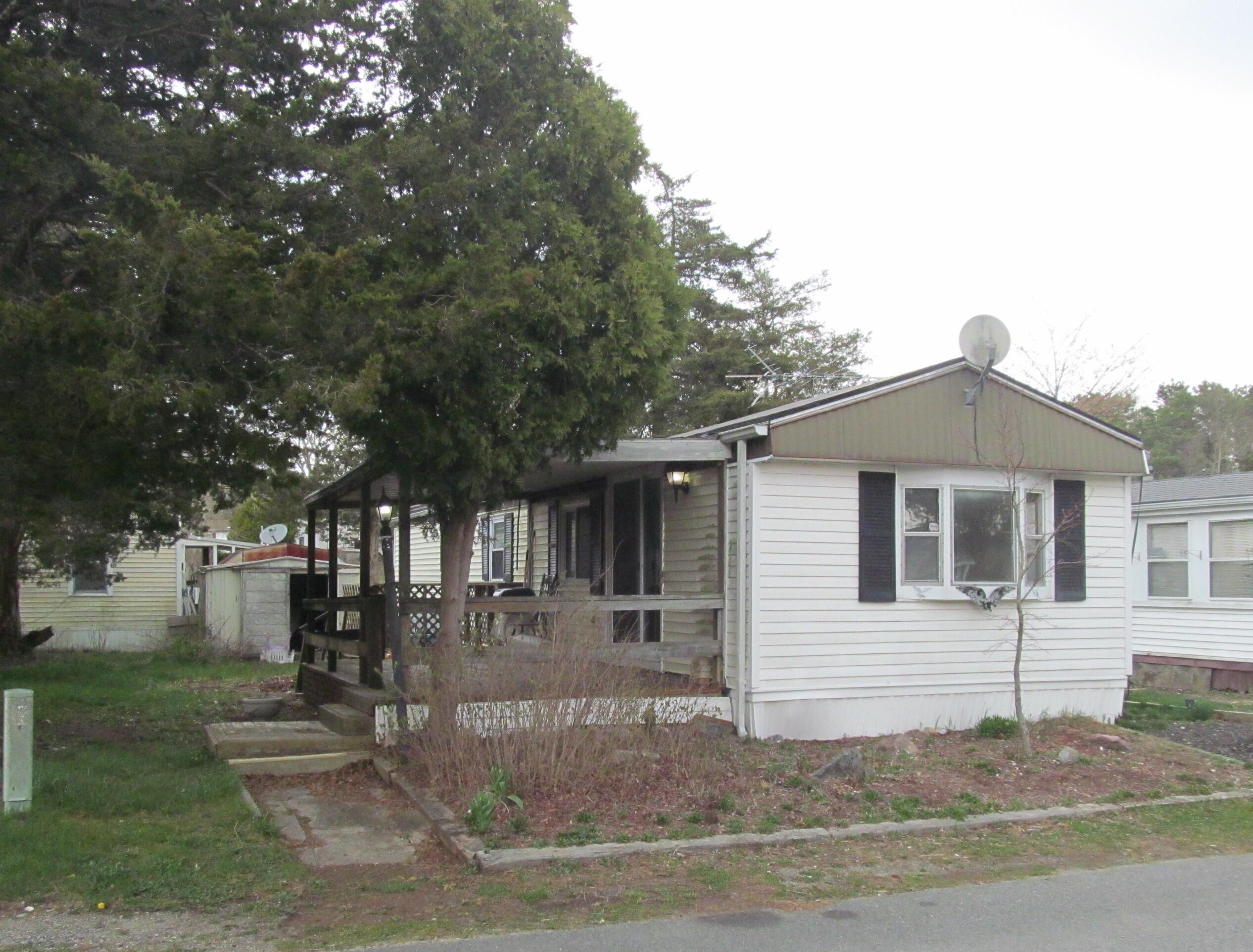 a front view of a house with garage