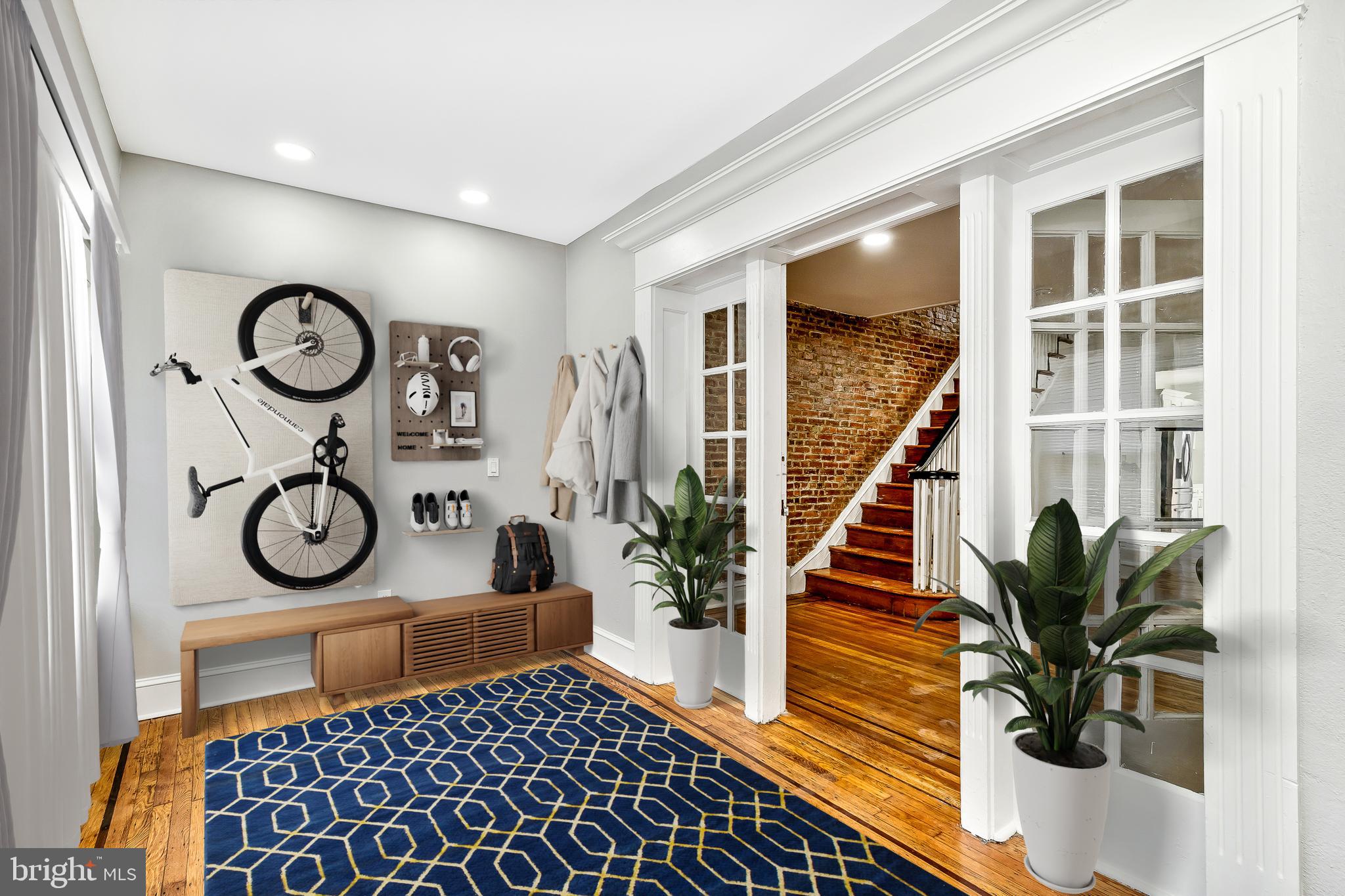 a view of entryway with wooden floor