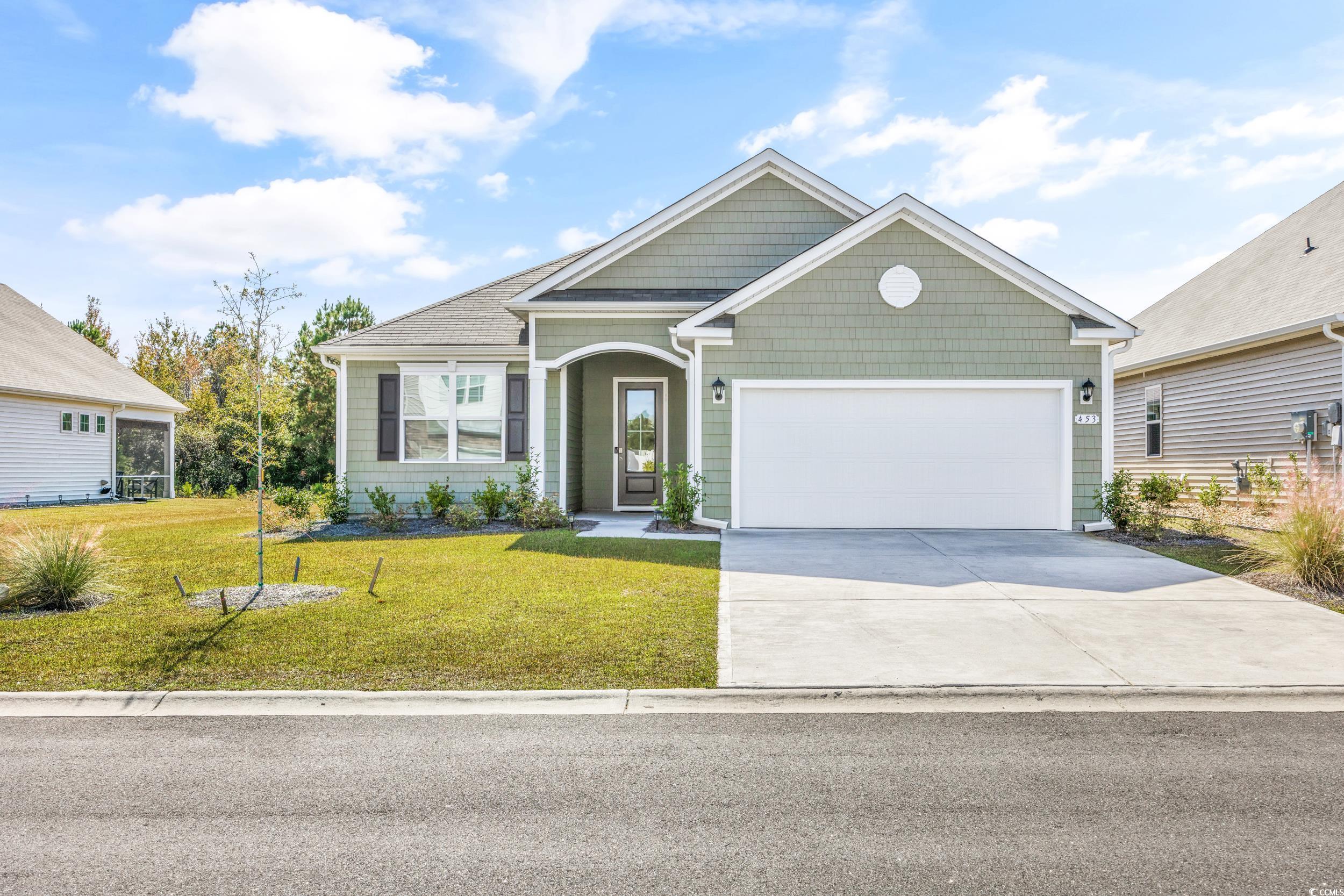 View of front of house featuring a front yard and