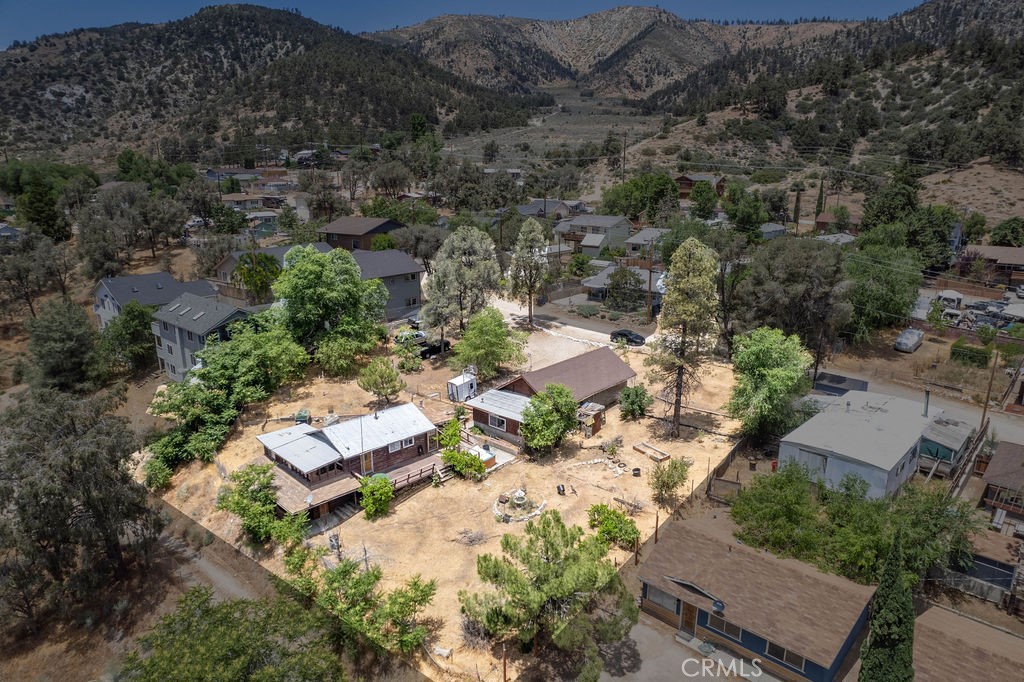 an aerial view of residential house with outdoor space