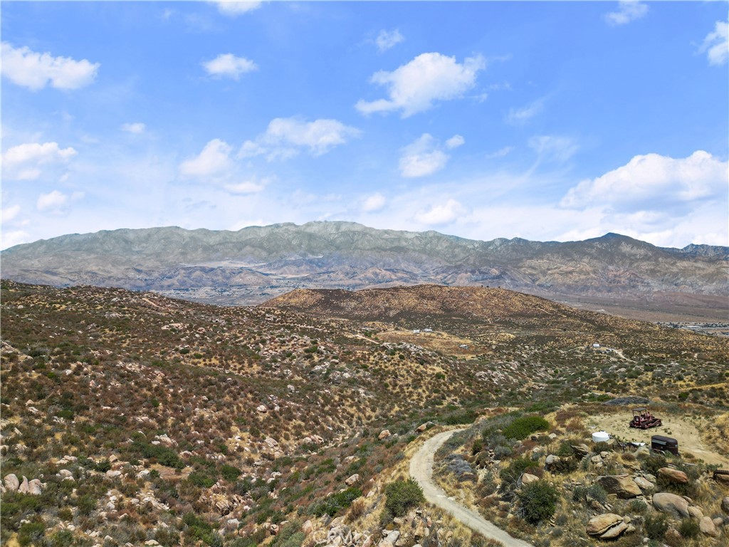 a view of a city with mountains in the background