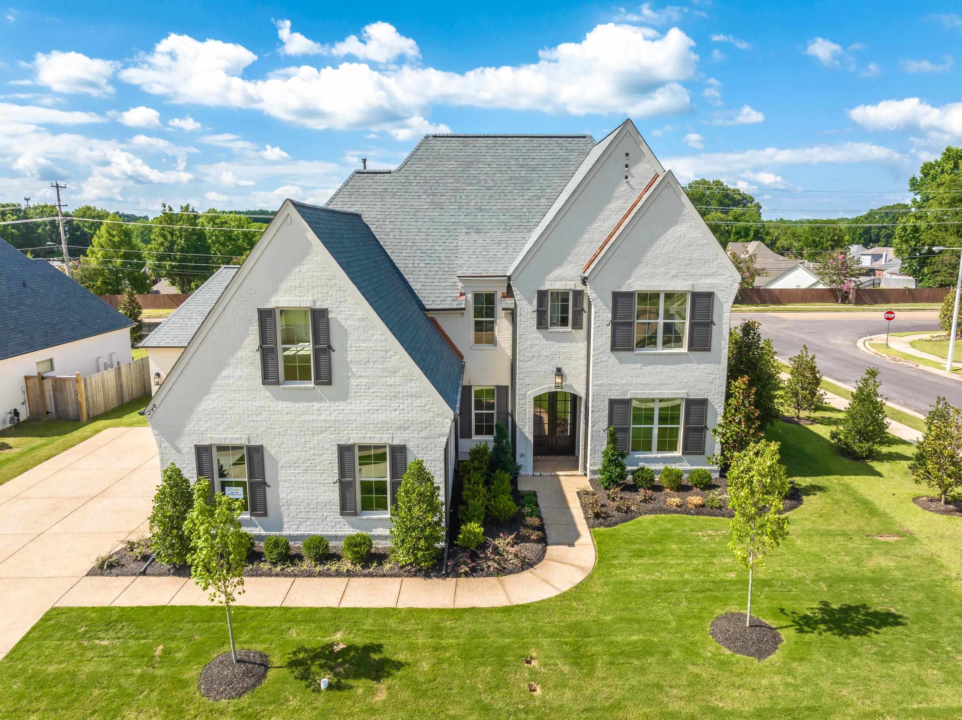 View of front of property with a front lawn