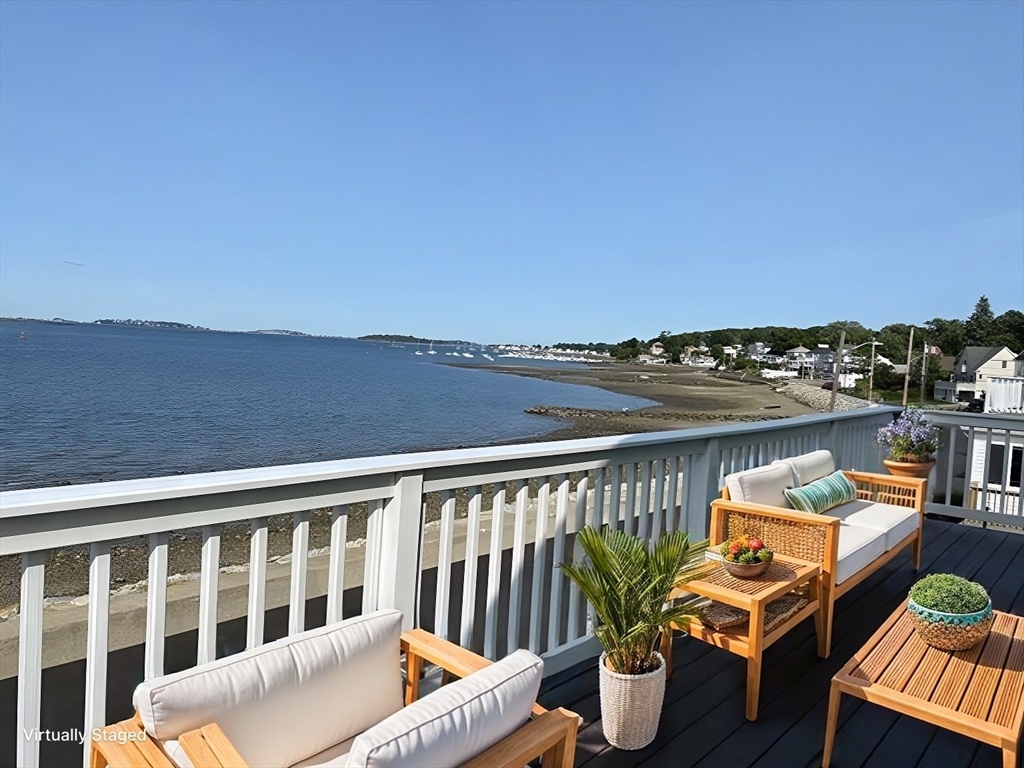 a view of a chairs and table on the terrace