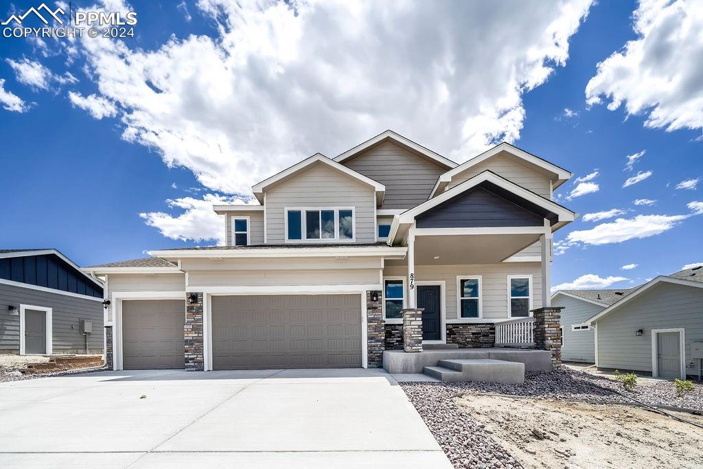 a front view of a house with yard