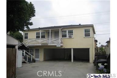 a front view of a house with yard