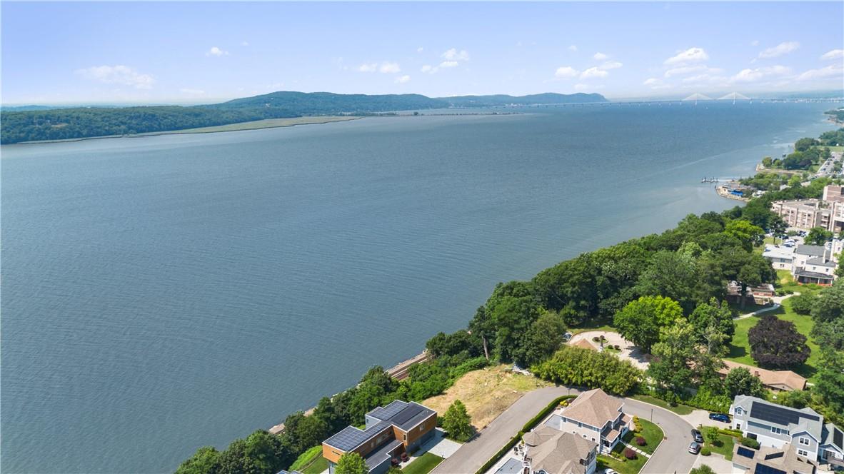 Aerial view with a water and mountain view