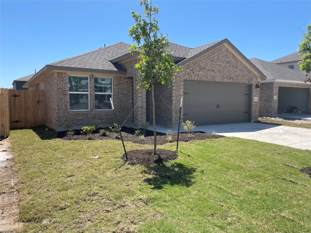 a house view with a garden space