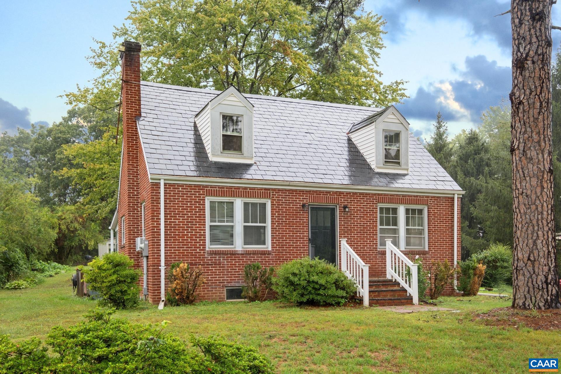 Cape Cod built in 1945, brick with a slate roof.