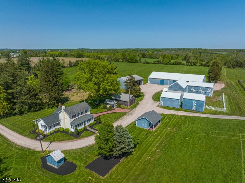 an aerial view of a house with garden space