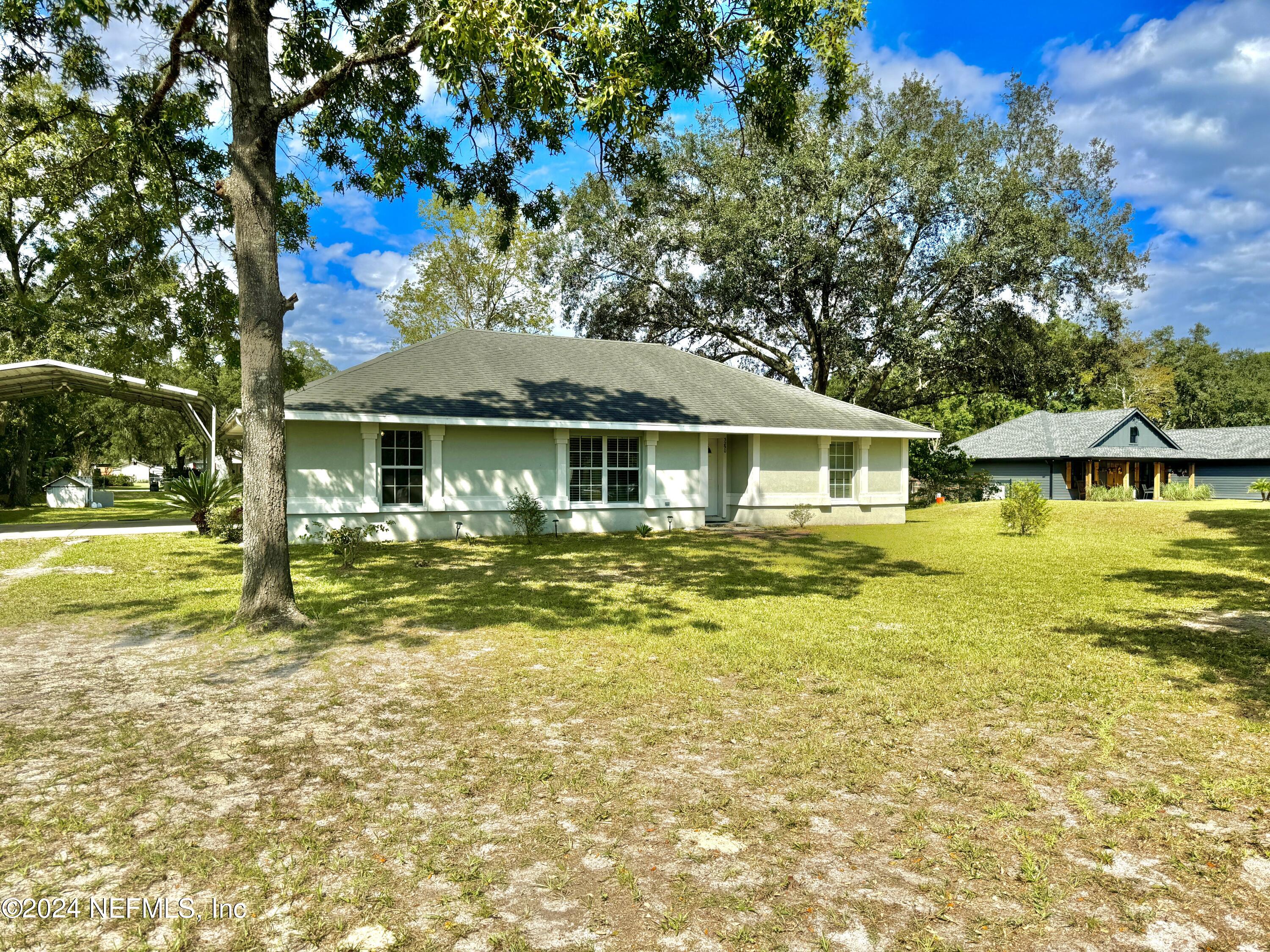 a front view of a house with swimming pool