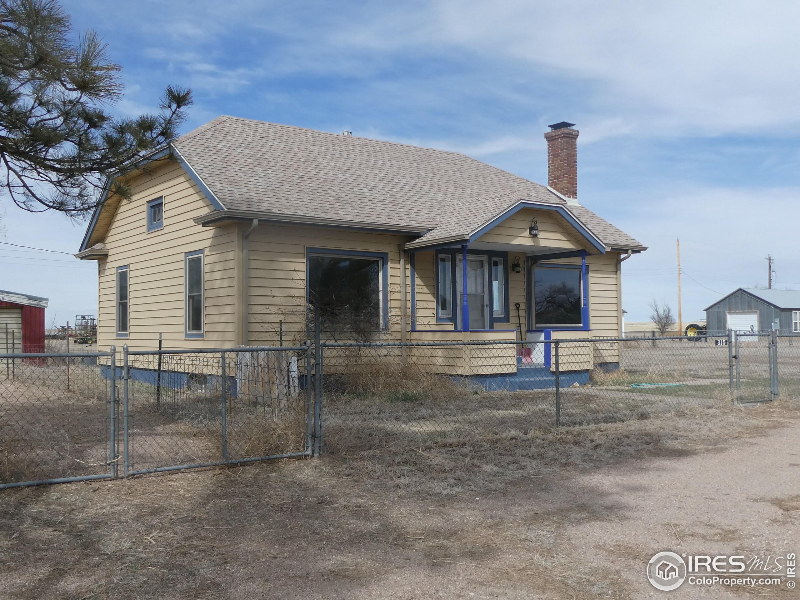 a front view of a house with a porch