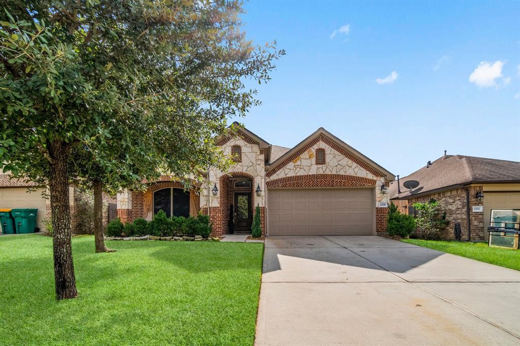 Welcome to 2206 Maple Point Drive! This stunning home features a classic brick and stone elevation, offering both elegance and curb appeal. With its fully bricked sides and charming arched details, this property makes a grand first impression.