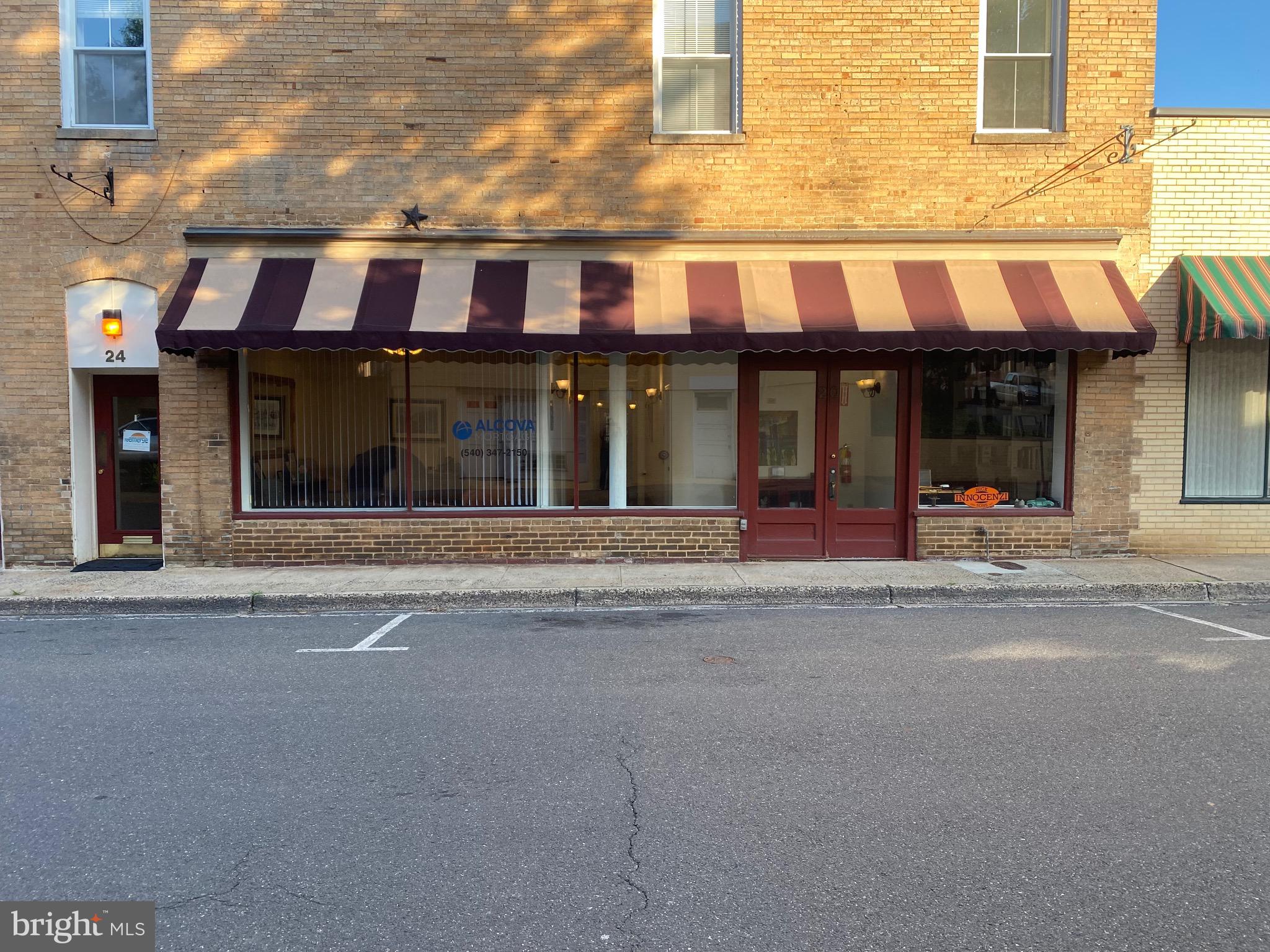 front view of a building with a street