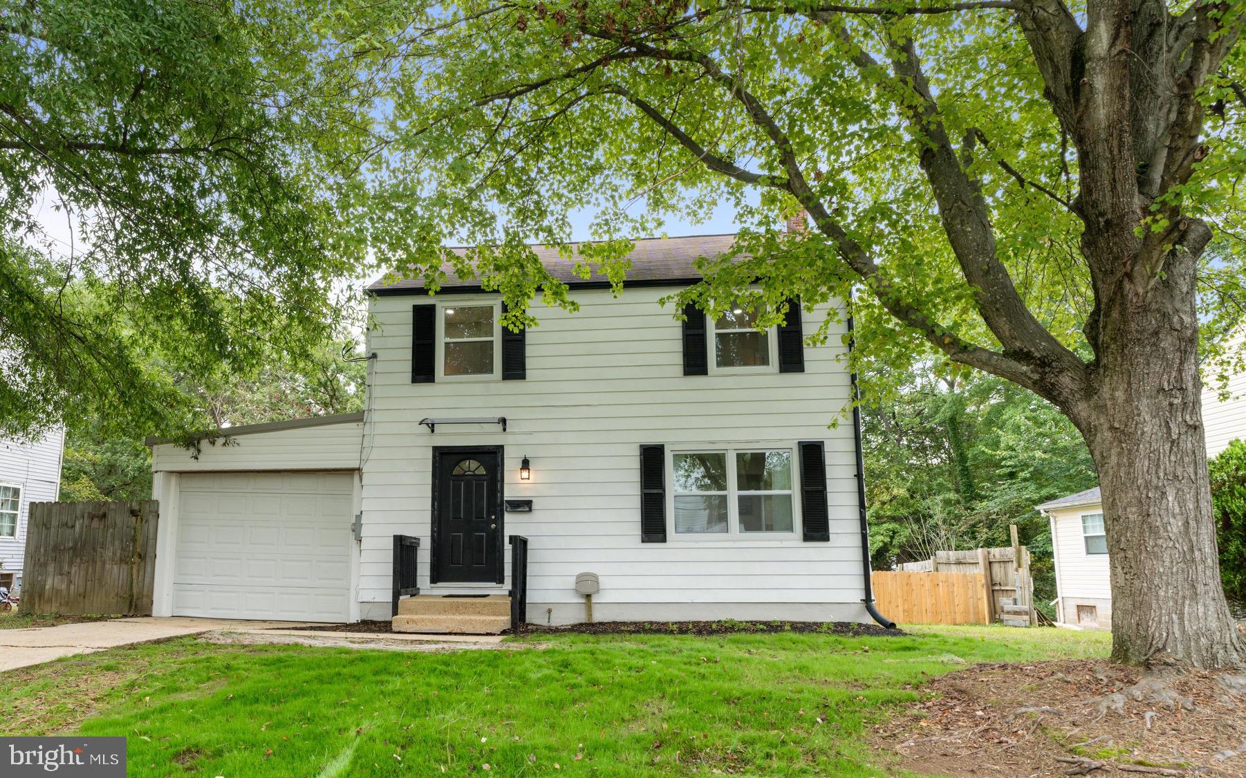 front view of house with a yard