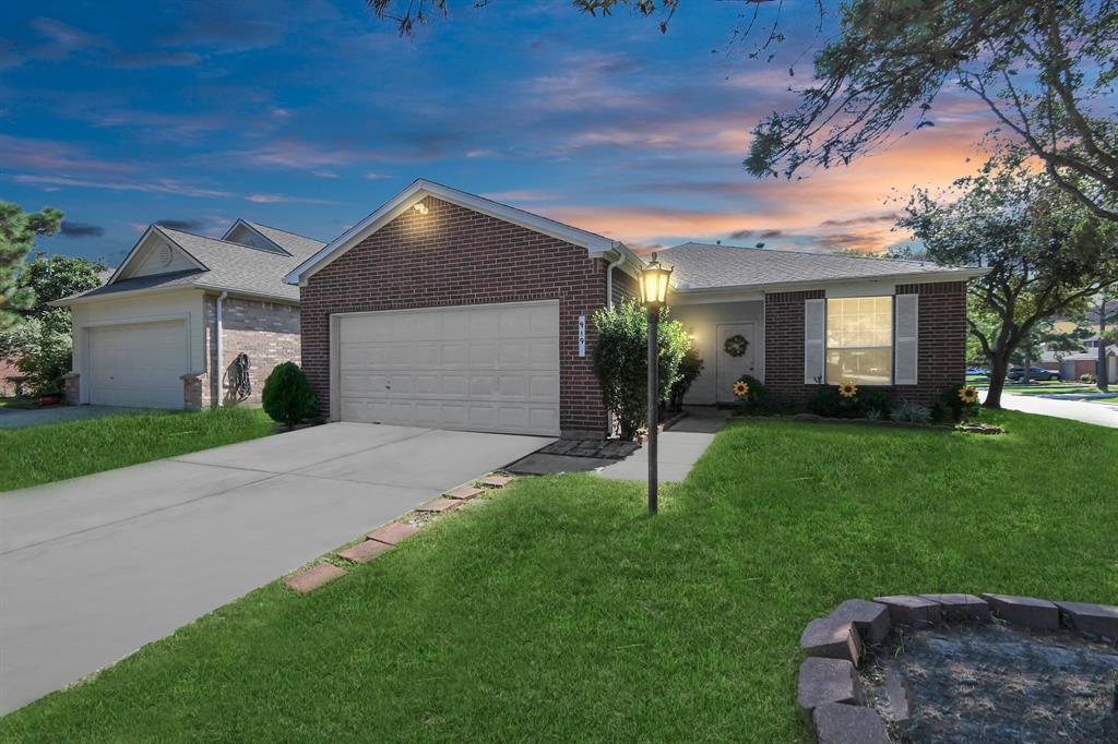 a house view with a garden space