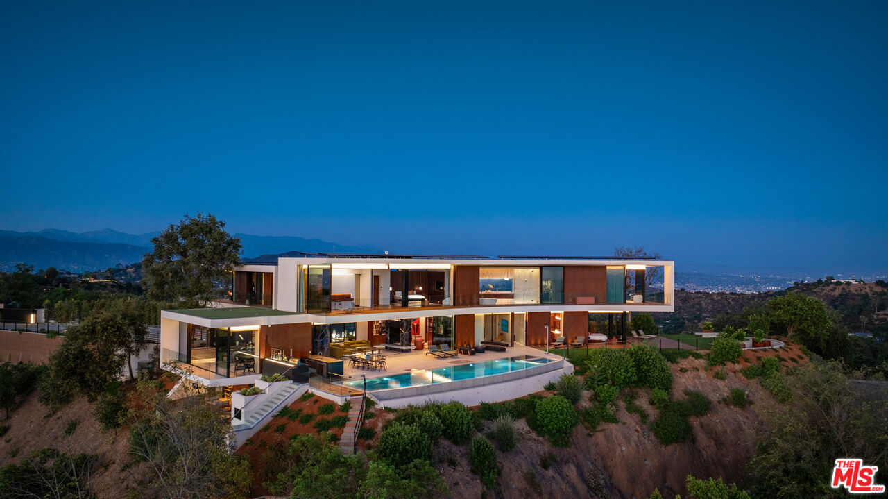 a view of houses with an outdoor space and lakeside