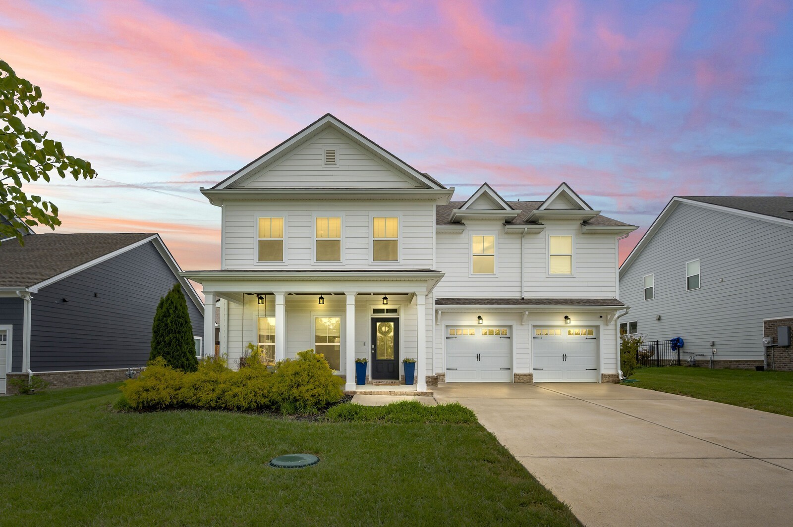 front view of a house with a yard