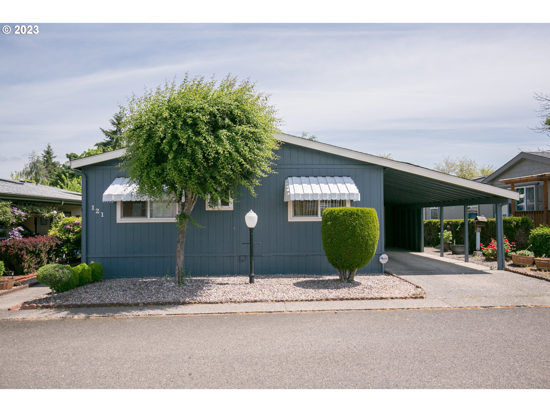 a view of a building with a yard