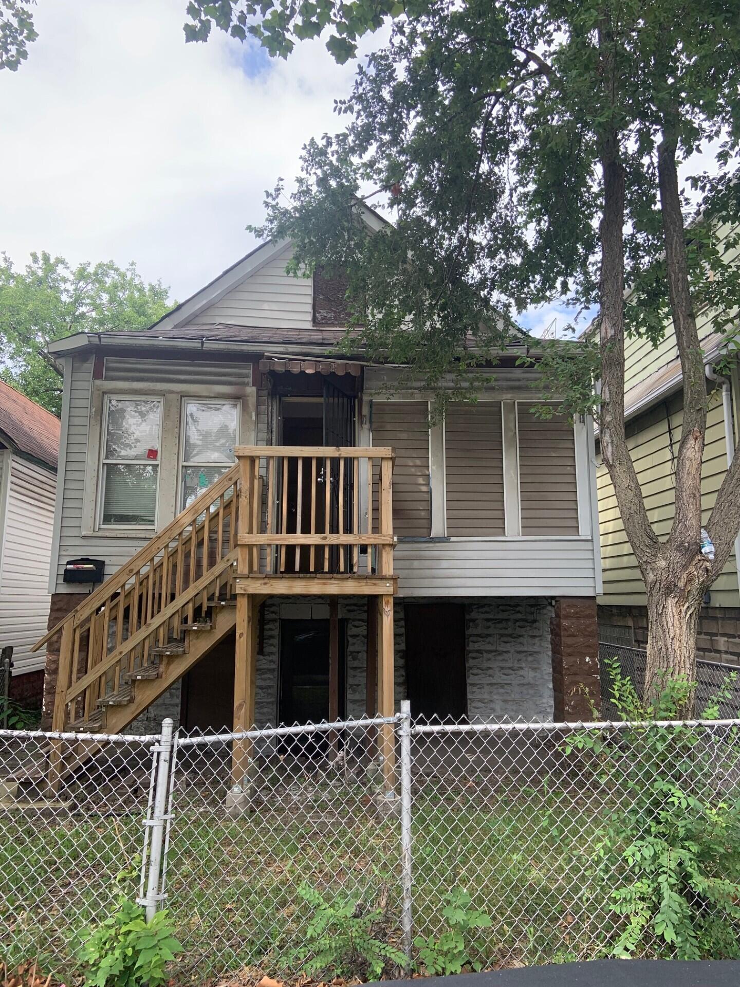 a front view of a house with balcony