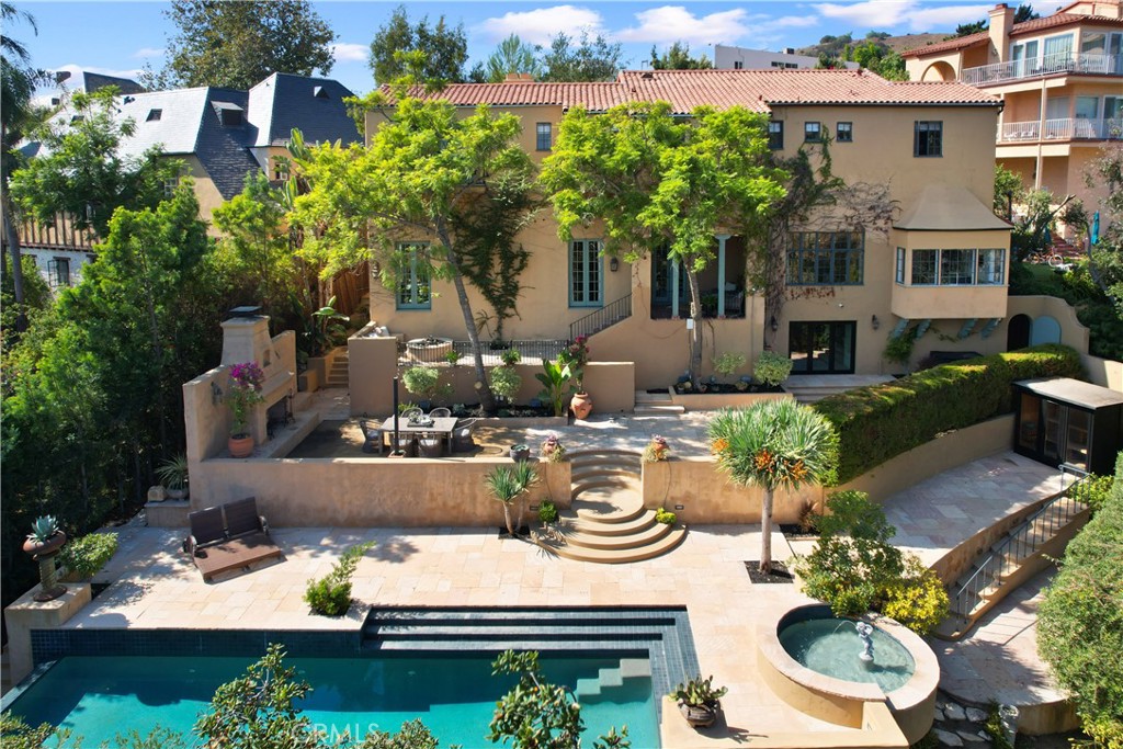 a view of swimming pool with patio