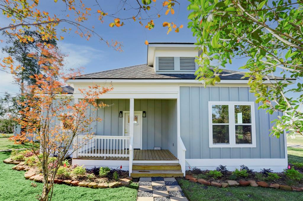 front view of a house with a yard