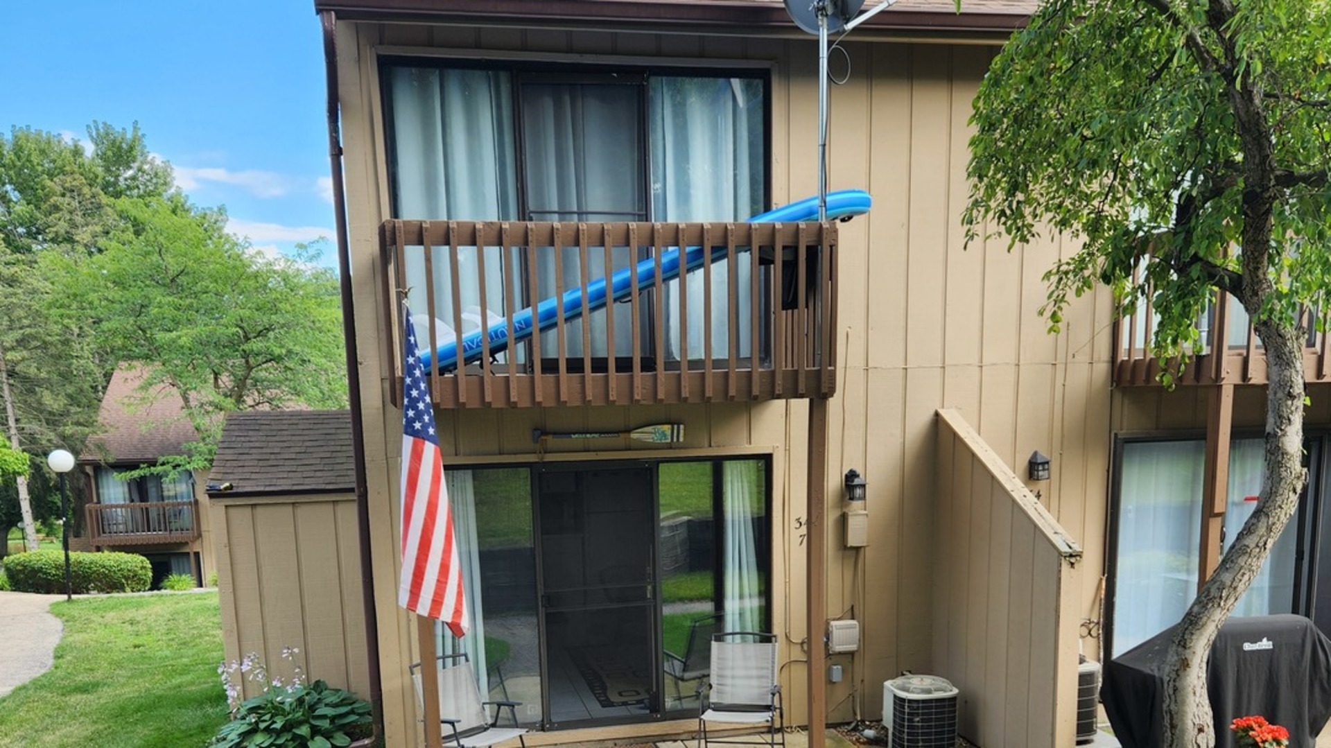 a view of a house with a deck