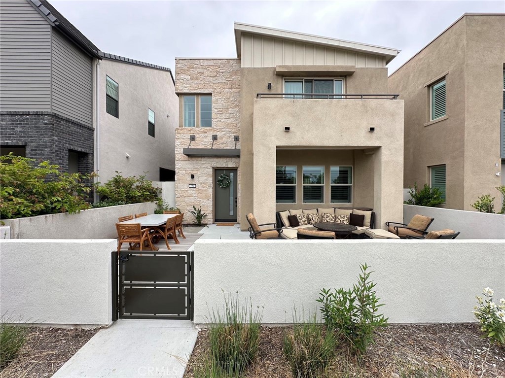 a view of house with outdoor seating space