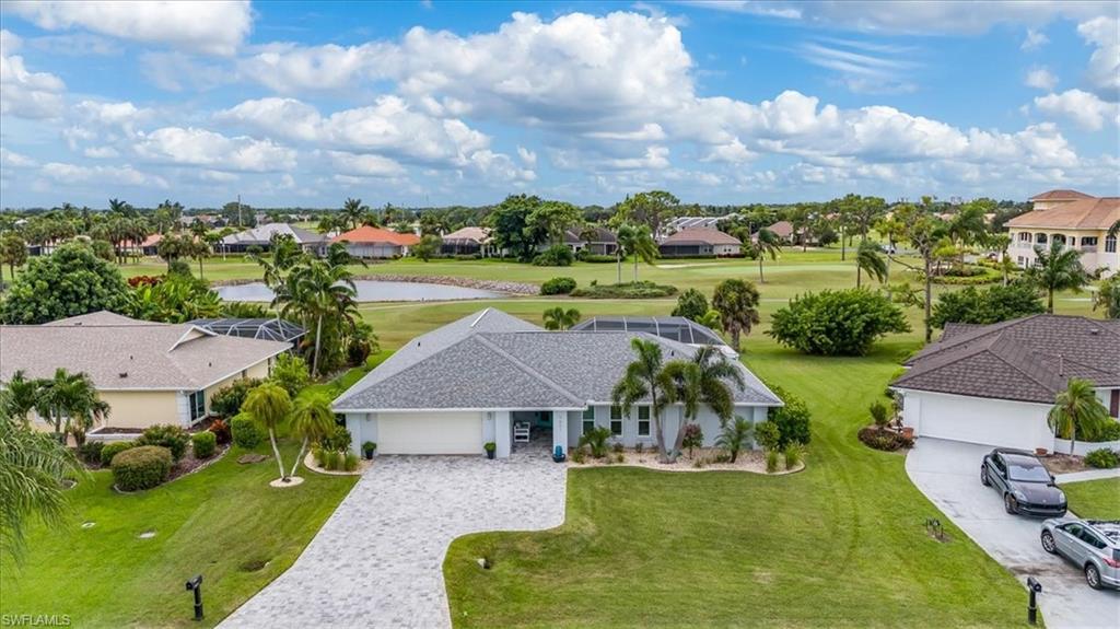 an aerial view of a house with a garden