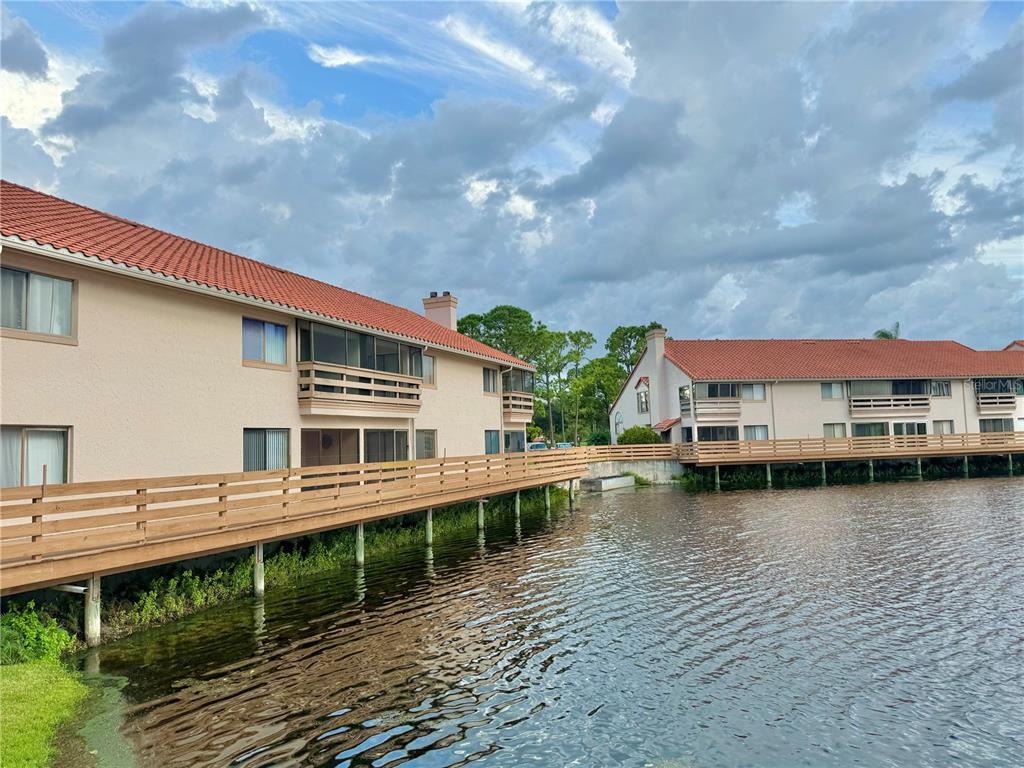 a house with river in front of it