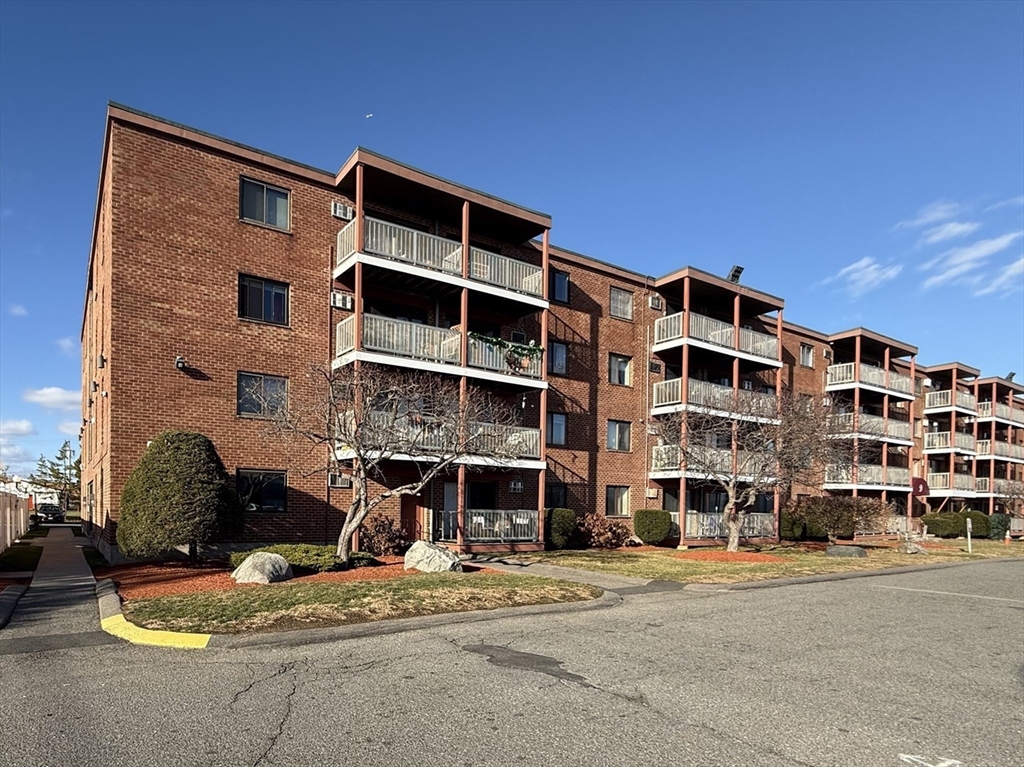 a front view of a building with street view