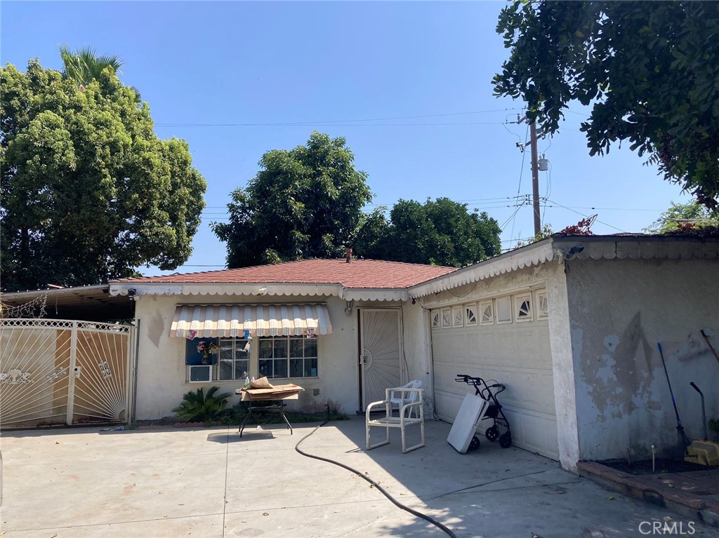 a front view of a house with patio