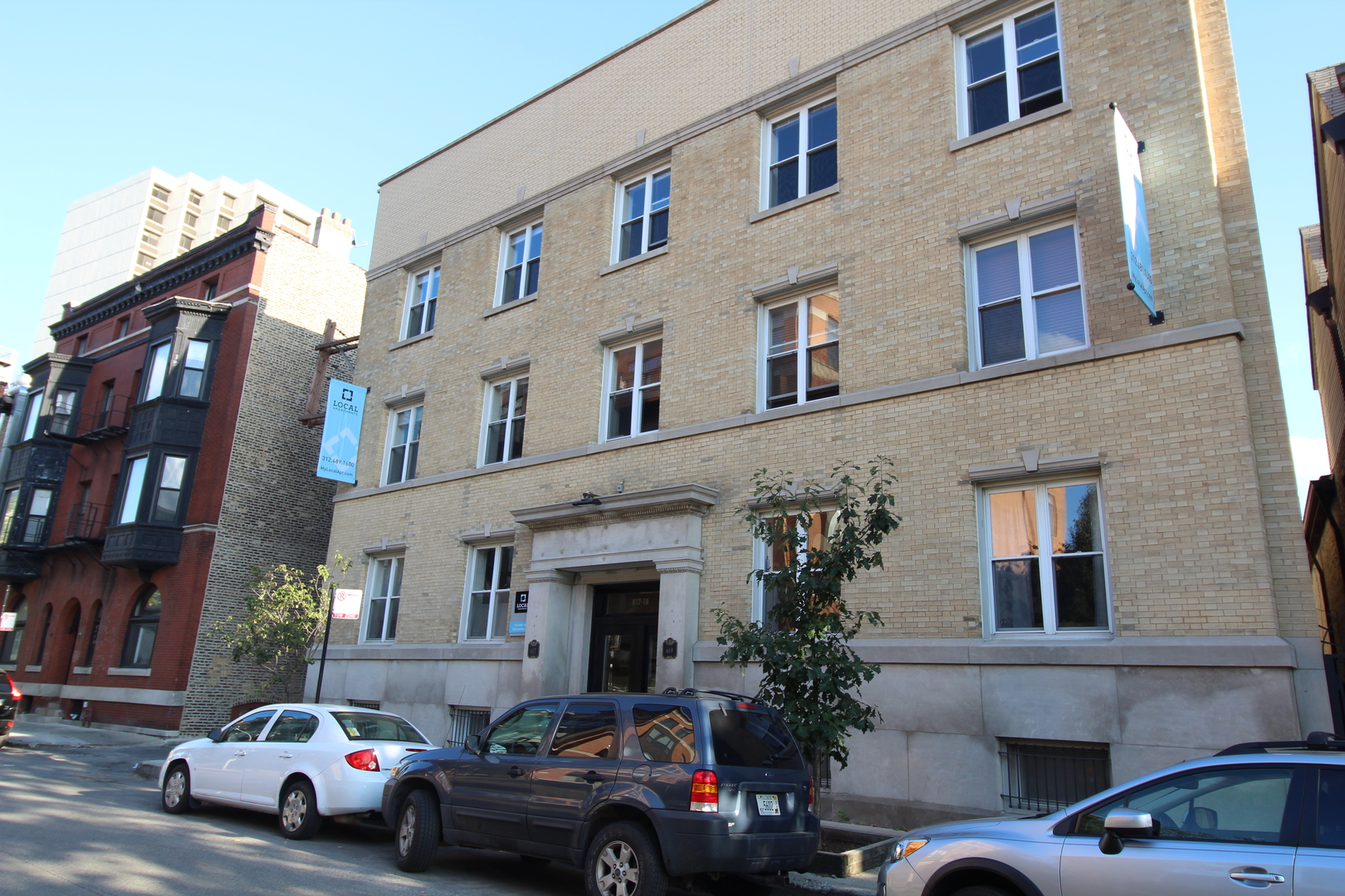 a cars parked in front of a building