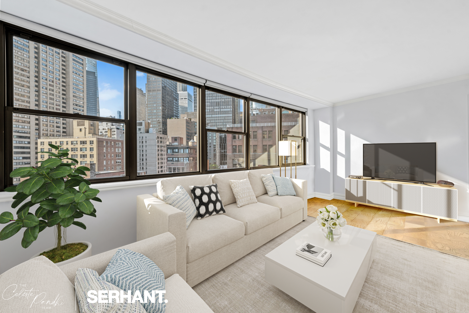 a living room with furniture and a large window