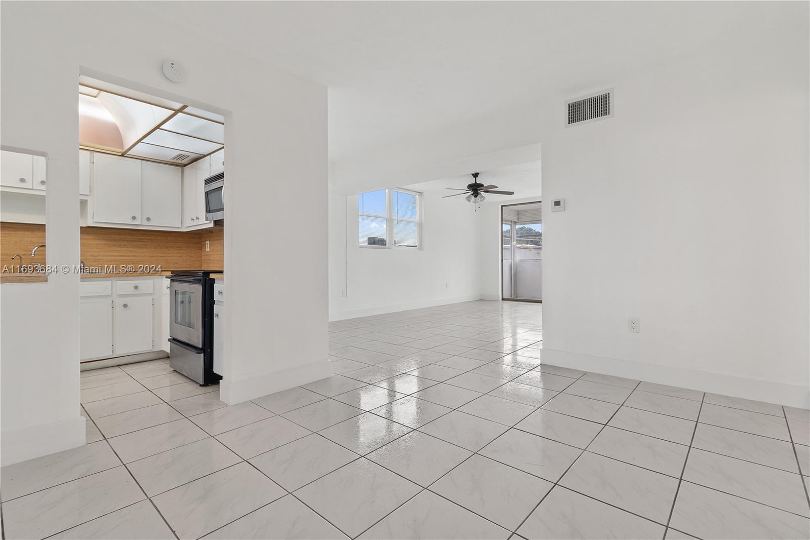 a view of a storage & utility room with two washing machine