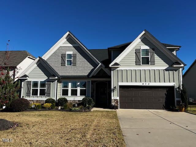 a front view of a house with yard